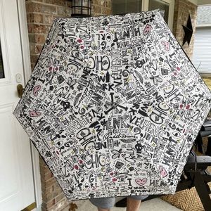 HENRI BENDEL collapsible umbrella.